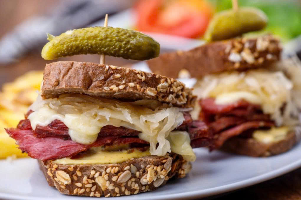 Some popular German bread toppings: corned beef, pickled gherkins (or pickled cucumbers), and cheese. Photo: iStock.