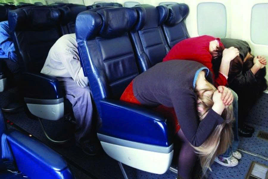 Brace Position: How to Minimize Injury During an Aircraft Emergency The safety posture, known as the Brace Position, required by flight attendants during an aircraft emergency. Photo: Ehsthunderbolt